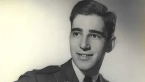Sepia photograph of a young man in military attire