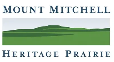 mount-mitchell-heritage-park-logo-2-400x217 Mount Mitchell Heritage Park logo with stylized blue sky and layered green mountain.